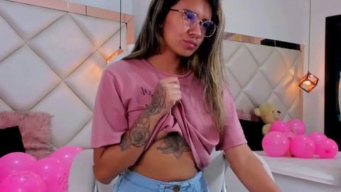 Tattooed brunette with glasses looks amazing and craves fun with you