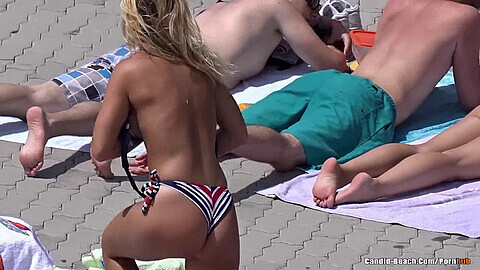 Take her top off, topless sunbathing, take off beach