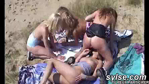 Inexperienced French milfs and teens engage in lesbian fun on the beach