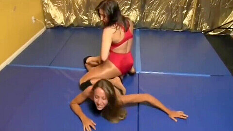 Sexy girls engage in intense grappling and sensual wrestling matches