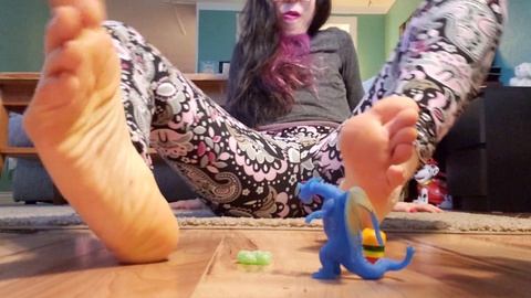 Dominating a gummy guy with my bare feet, making him surrender