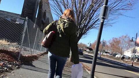 Wetting her pants twice while strolling in the city