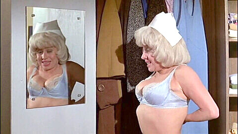 Die heißesten Szenen mit Barbara Windsor aus den Carry On Filmen in Zeitlupe und Standbild-Kompilationen ihrer erstaunlichen großen Brüste.