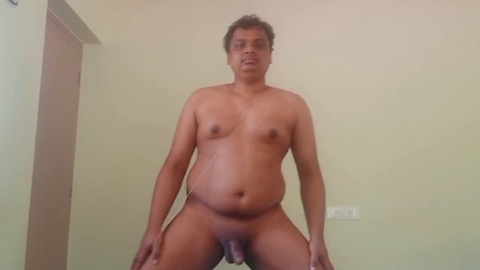 Chubby Desi gay boy undresses for solo fun