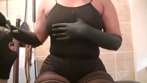 Thrilling toilet play in a sexy see-through catsuit
