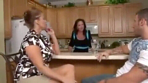 Naughty MILF neighbor gives sloppy blowjob to college student while her husband cooks dinner