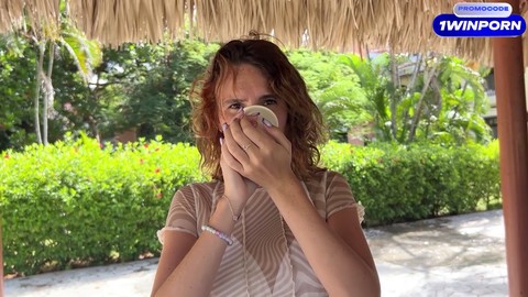 Mini bikini beauty undresses while playing beer pong in a fun game