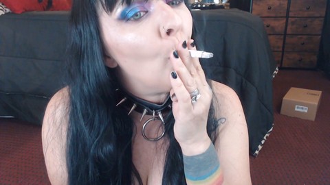 Gothic milf with no bra smoking seductively