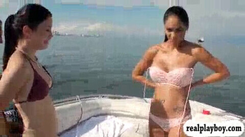 Beautiful babes indulge in a steamy foursome session on a speed boat