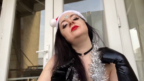 Domme Lara indulges in some Christmas smoking - fetish delights