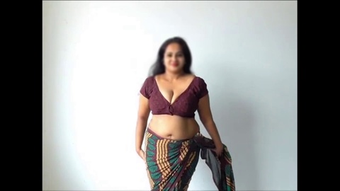 Indische Stiefmutter Disha gibt eine außergewöhnliche Handjob, während sie an meiner Brustwarze saugt und mit einer Ejakulation endet