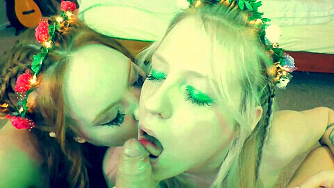 Sensual duo of green fairies, led by blondie Summer Hart, indulge in a mesmerizing double blowjob