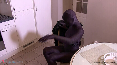 Dark-colored full-body suit for fetish enthusiasts