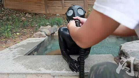 Gas mask, breath holding, breathing from rubber drysuit