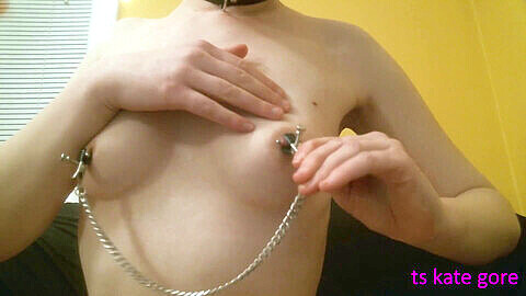 TS Kate Gore dominates and pleasures with nipple clamps and adult toys