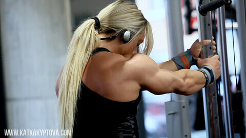Fbb bending iron bar, female bodybuilders, muscular pecs