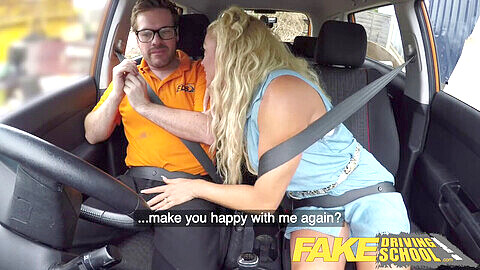 Busty British babe gives a rough titjob and backseat blowjob in the fake driving school