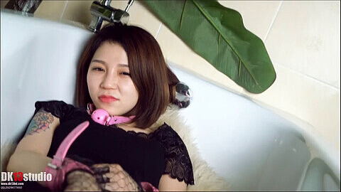 Asian Kinkster Ms. Li tied up and ball-gagged in motel shower before being discovered