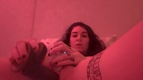 Tattooed Milf pleasures herself by pounding her horny MILF pussy with a vibrating dildo in her asshole
