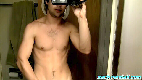 Muscular young stud Zackrandall films himself jerking off with his massive meat pole