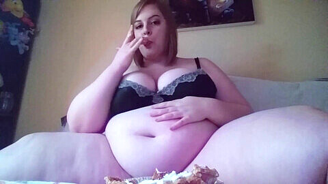 Curvy porcelain beauty enjoys licking cake seductively